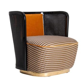 Estila Art-deco luxusné kreslo Brilon s čiernym ratanovým operadlom a vzorovaným zamatovým poťahom na zlatej podstave 74cm obrázok